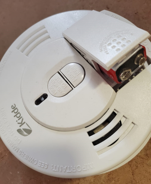 High Interior Cleaning - changing smoke alarm batteries and light bulbs (Peak Window Cleaning).