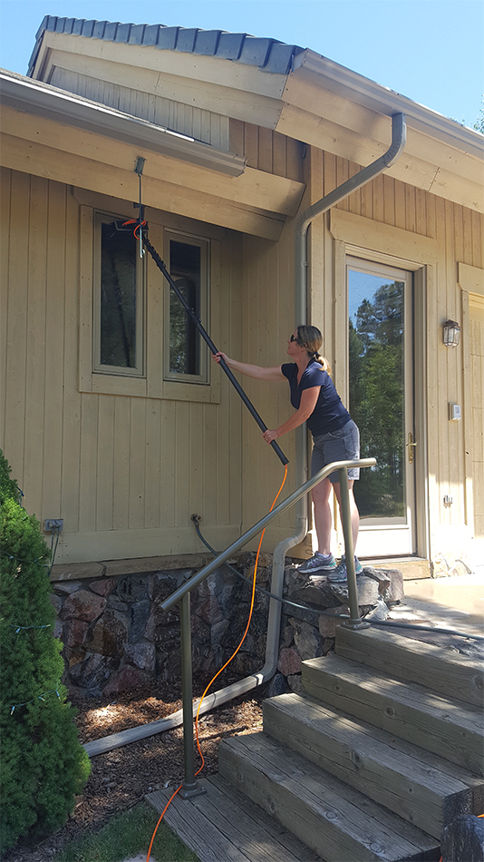 Owner Valerie Simpson cleaning windows - Peak Window Cleaning LLC (Colorado)